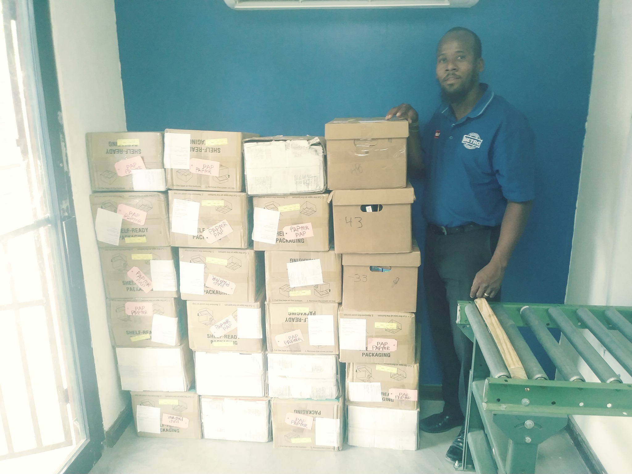 Picture of Jean Charles in PAP mailroom